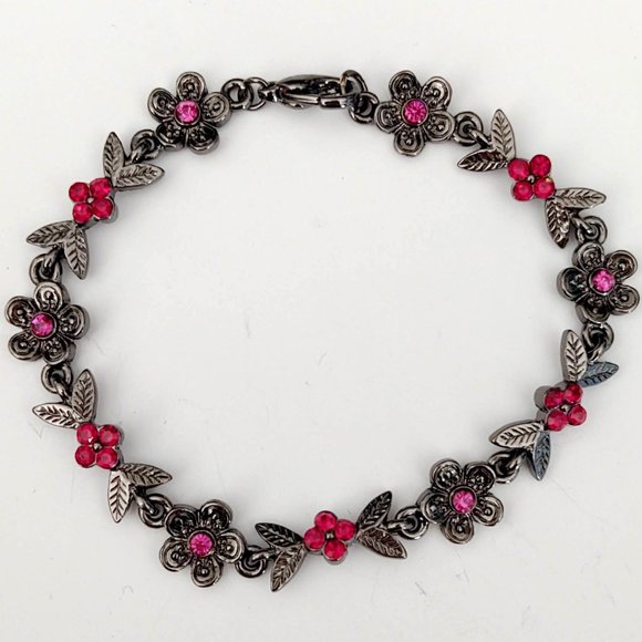 Jewelry - Dark metal floral bracelet w/red & pink crystals